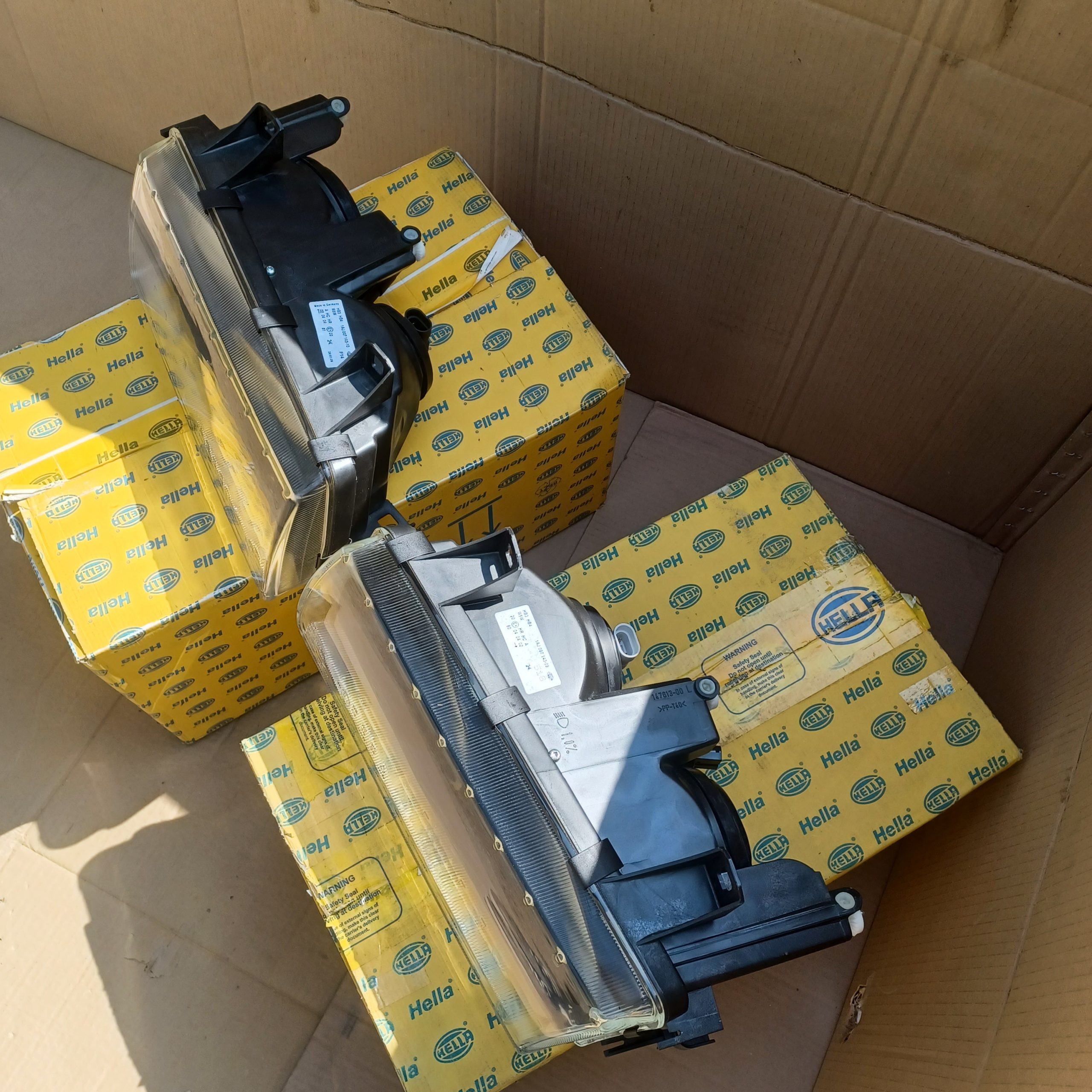 Lot 2 phares Hella G et D BMW Série 3 Compact E36 Arrivages Auto Pieces