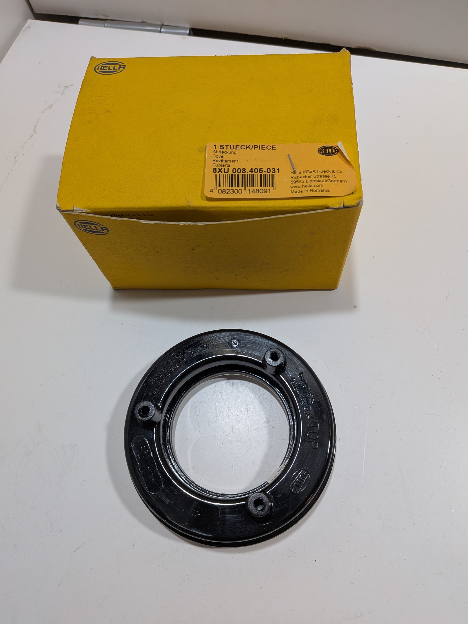 Revêtement entourage feu 8XU 008 405-031 Hella 98/55mm Arrivages Auto Pieces
